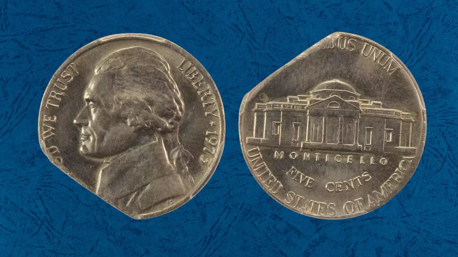 1973 Jefferson nickel struck on Lincoln cent planchet, showing copper color and smaller diameter versus normal nickel